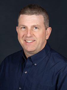Professional headshot of Kevin Hanscom