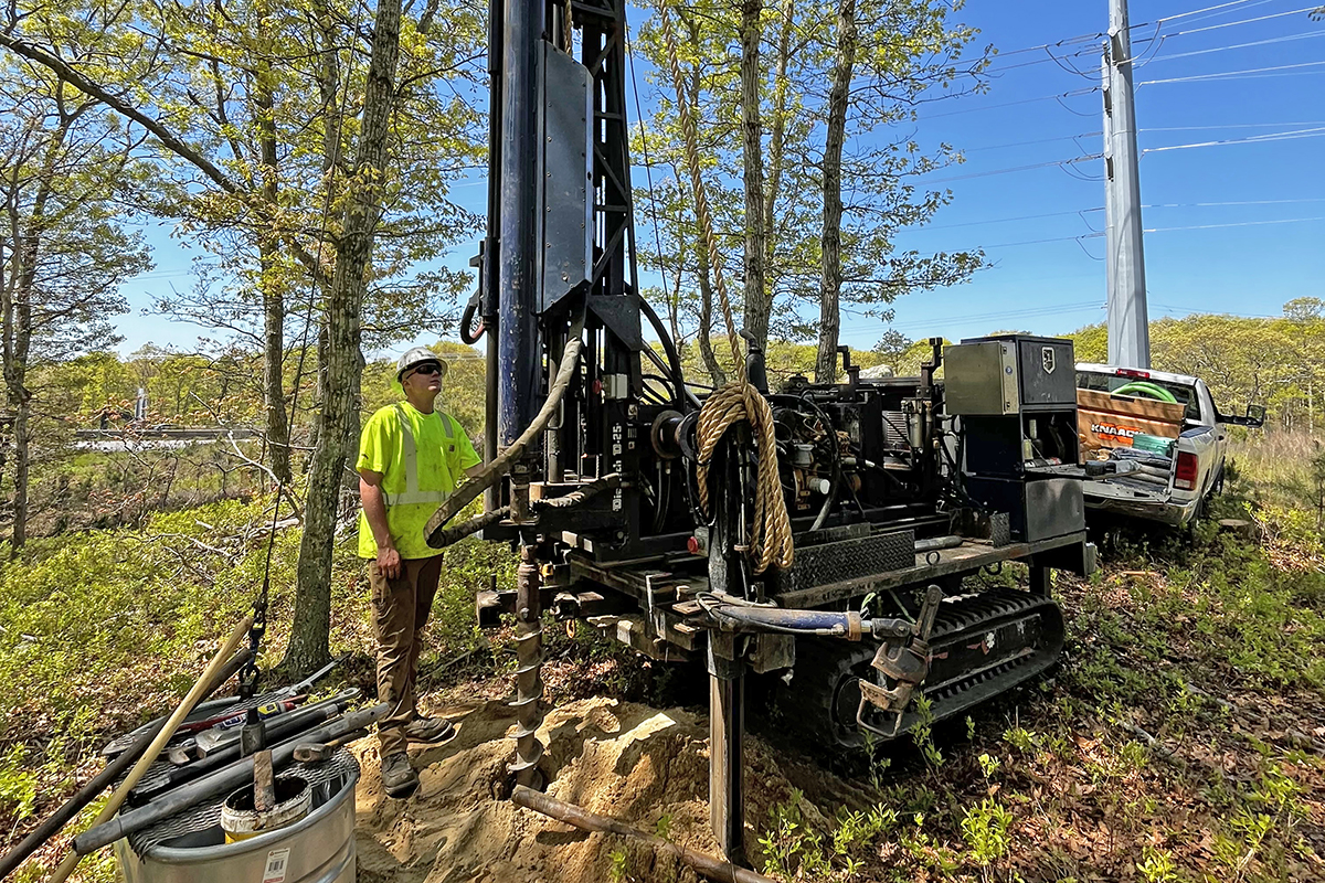 Driller Parker Johnson operating a geotechnical drill rig.