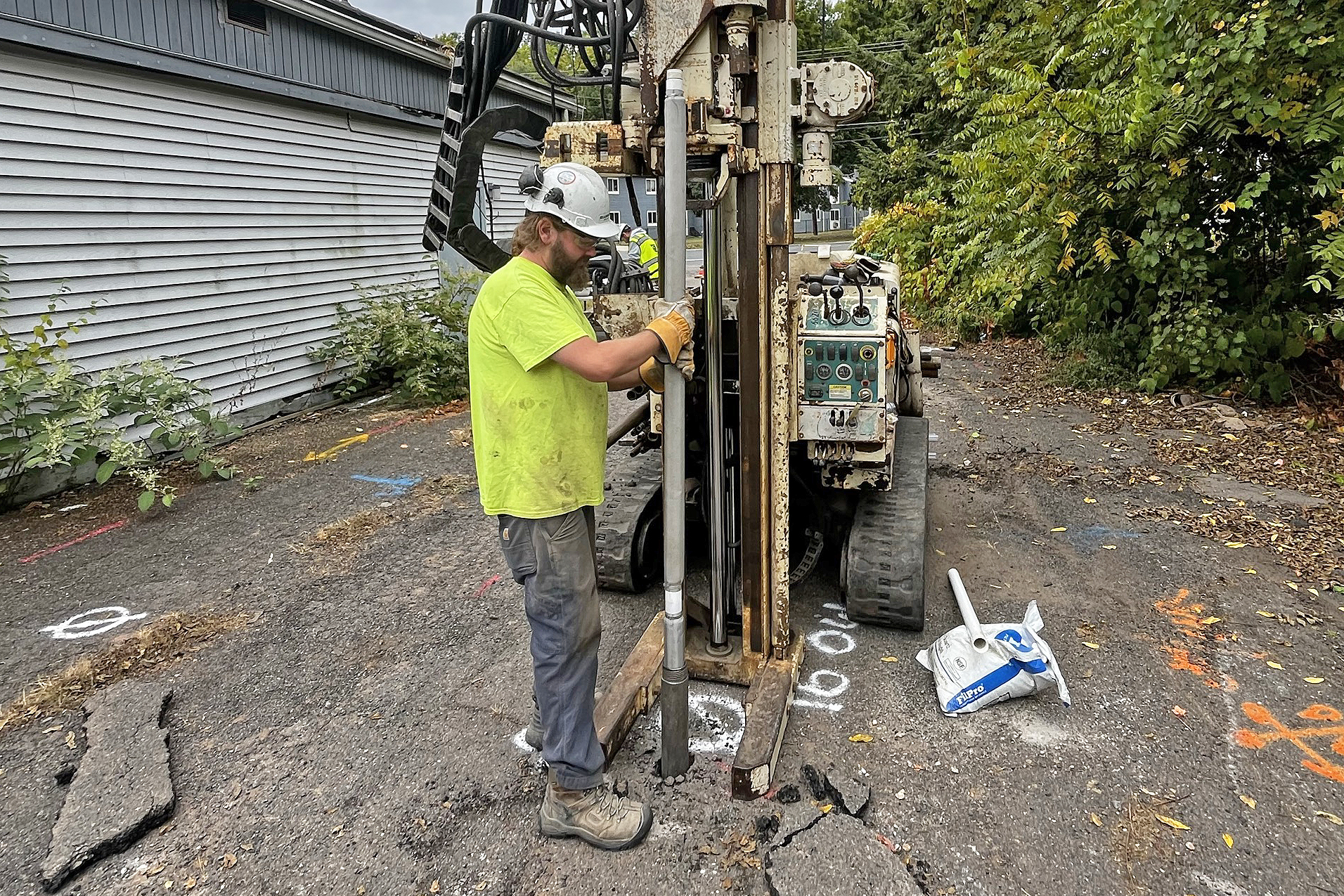 Environmental driller installing a monitoring well.