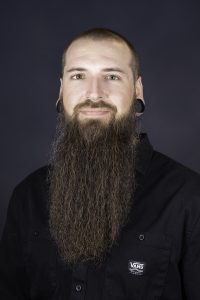 Professional headshot photo of Kevin Kenneson.