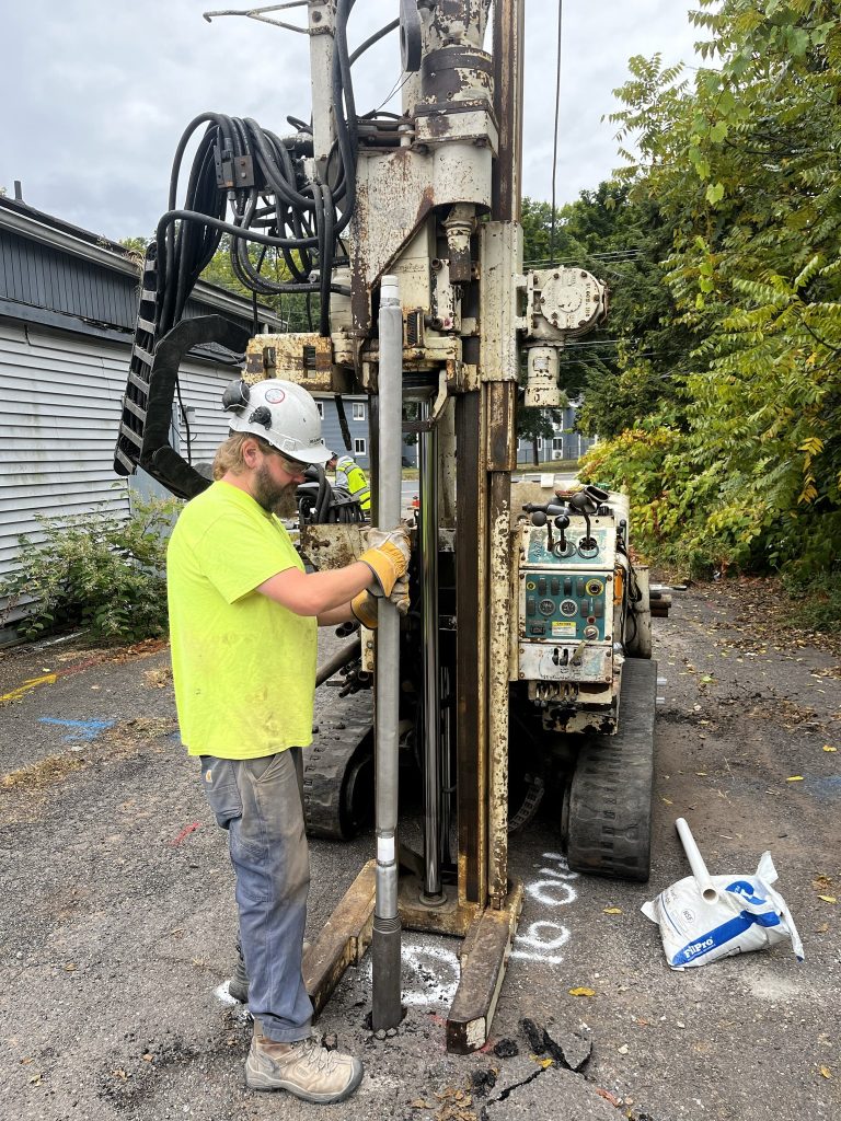Environmental driller installing a monitoring well.